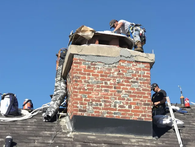 Buckeye Chimney Sweep installing a custom chimney crown in Buckeye, AZ