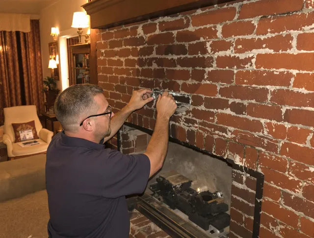 Buckeye Chimney Sweep expert fixing a fireplace in Buckeye, AZ